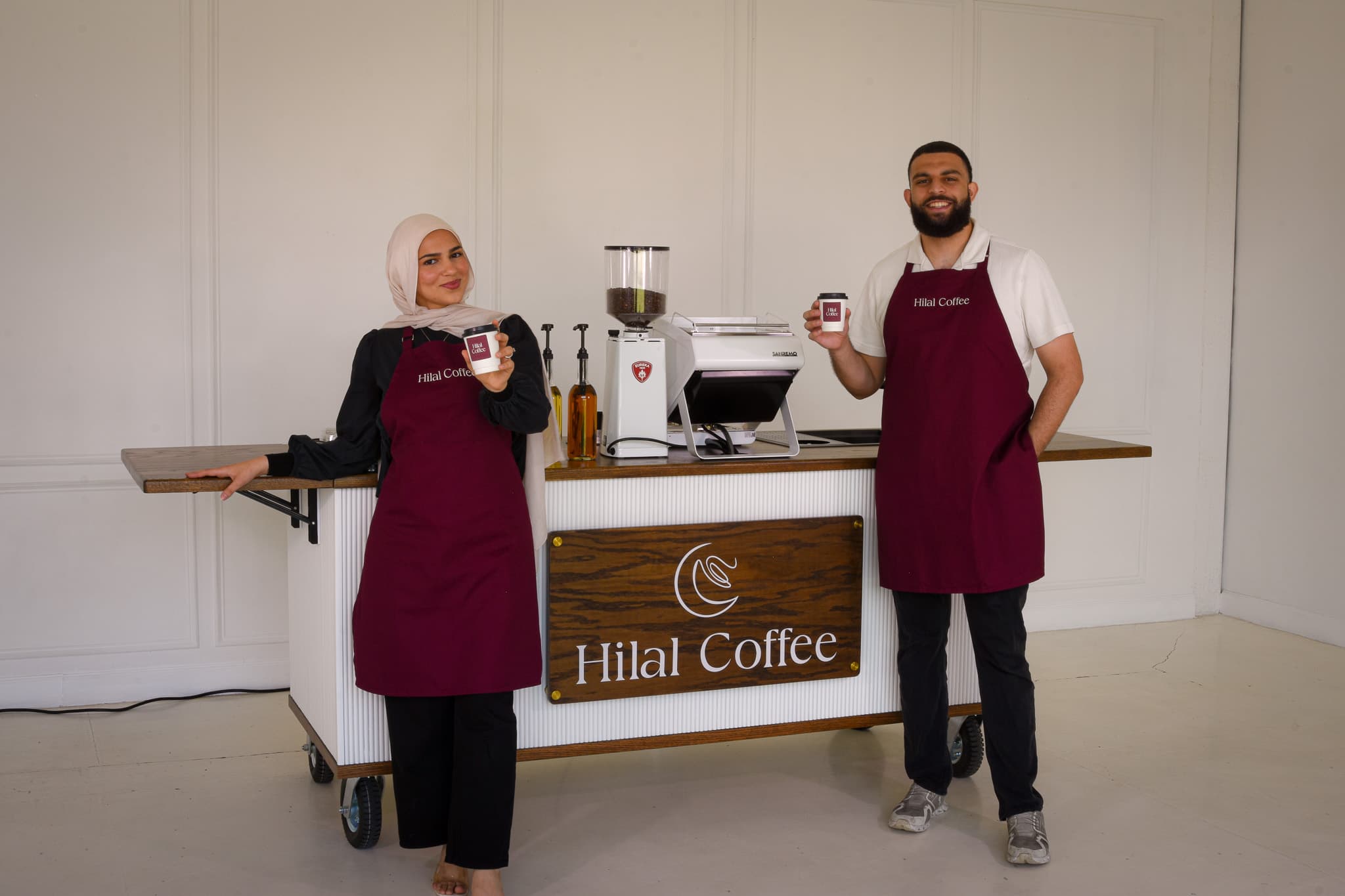 Hilal Coffee founders Ali and Meera running the mobile cart at an event